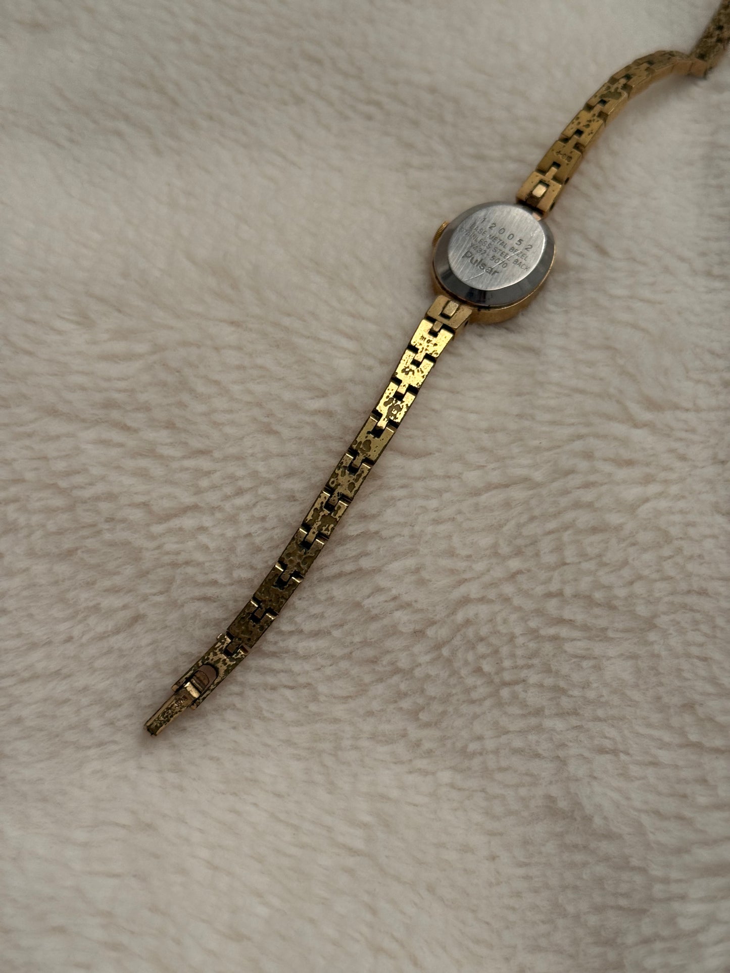 vintage pulsar gold watch