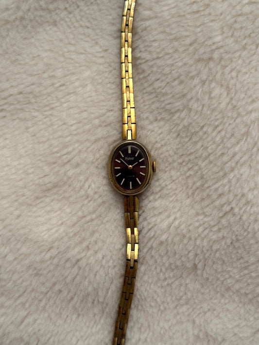 vintage pulsar gold watch