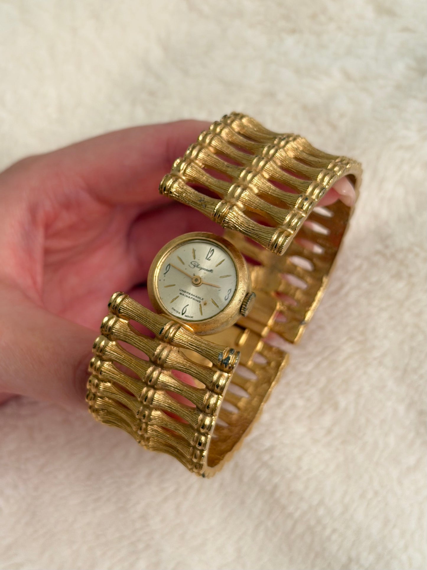 vintage Schiaparelli bamboo peekaboo watch