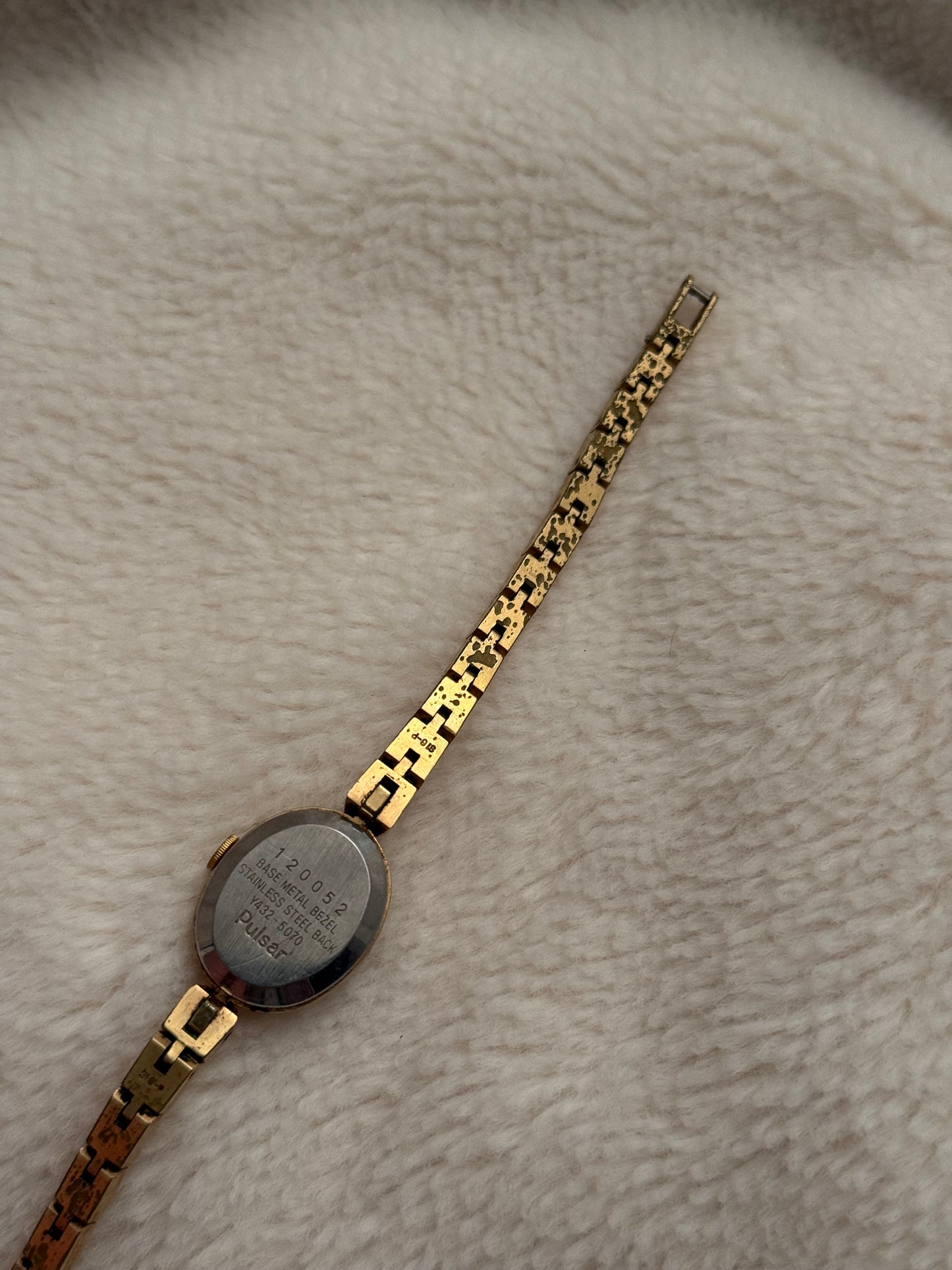 vintage pulsar gold watch